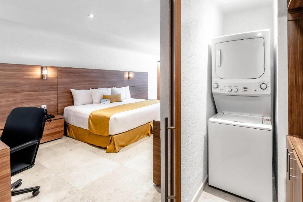 Postel nebo postele na pokoji v ubytování Comfort Inn Queretaro Tecnologico