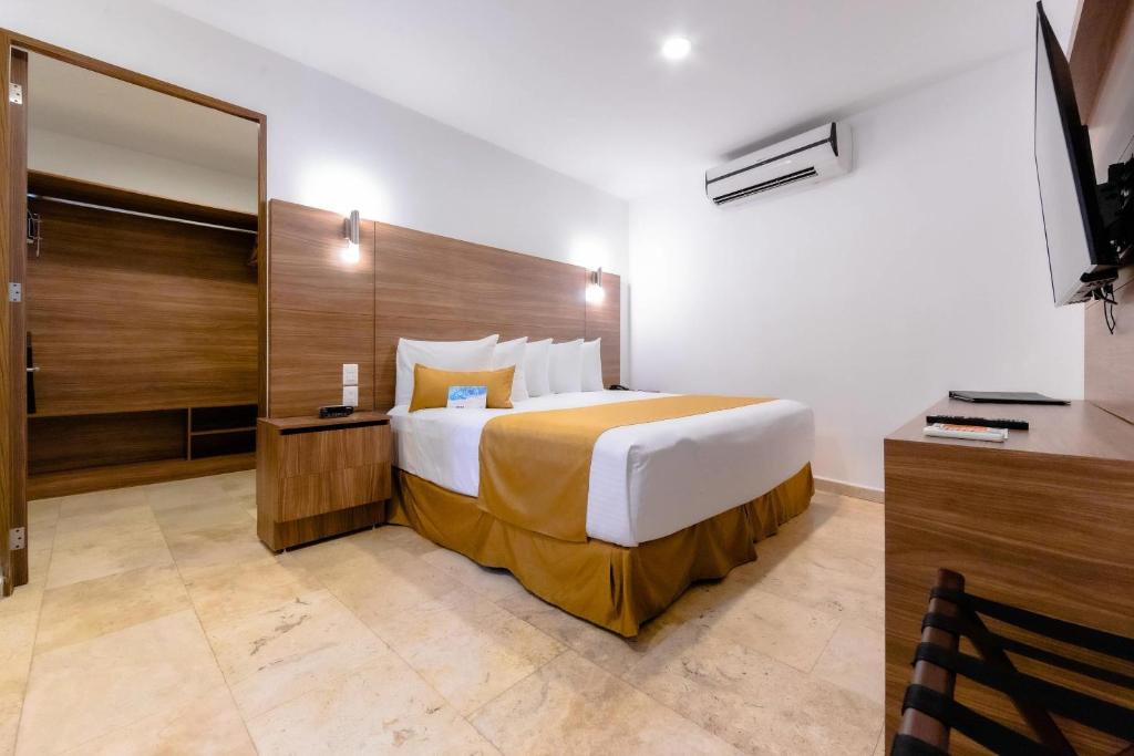 Postel nebo postele na pokoji v ubytování Comfort Inn Queretaro Tecnologico
