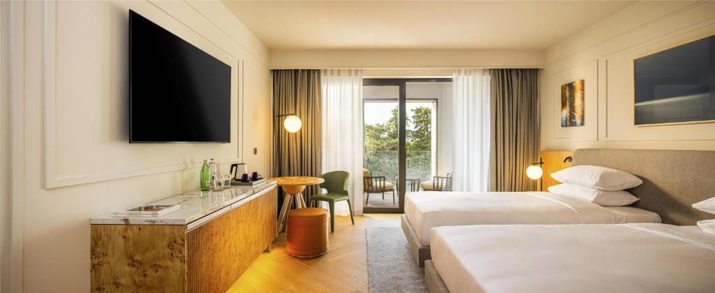 Postel nebo postele na pokoji v ubytování Hyatt Regency Zadar