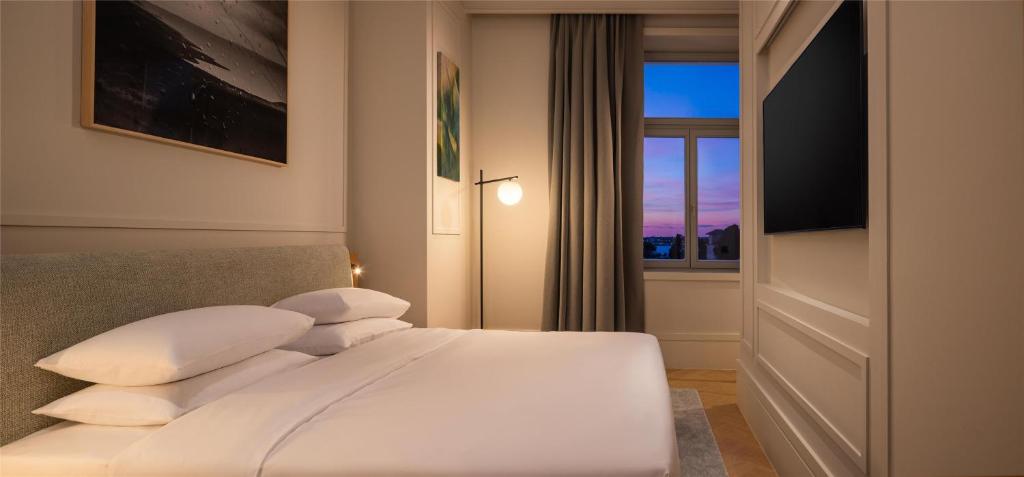 Postel nebo postele na pokoji v ubytování Hyatt Regency Zadar