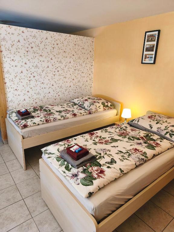Postel nebo postele na pokoji v ubytování Ubytování U Tajčů