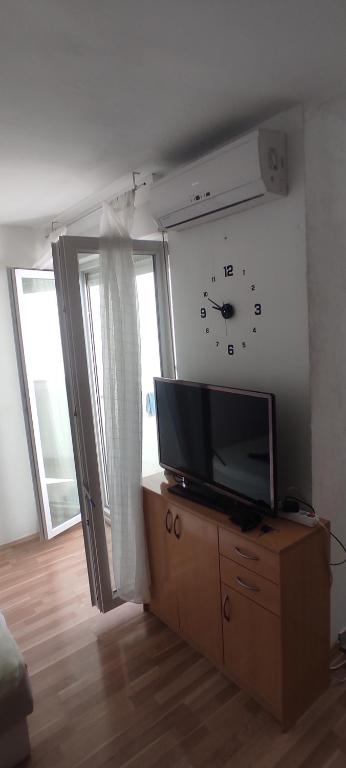TV a/nebo společenská místnost v ubytování Studio Apartment Ema