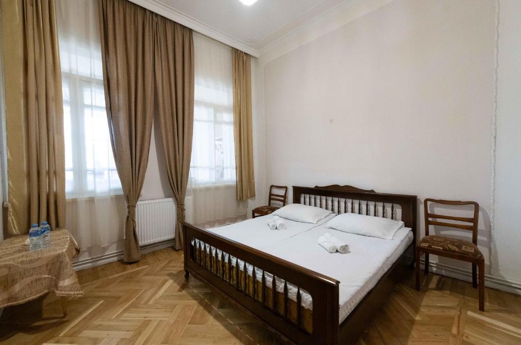 Postel nebo postele na pokoji v ubytování Anna's Guest House
