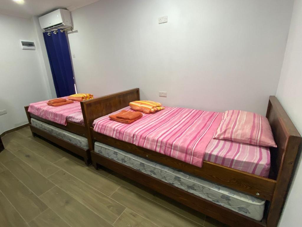 Postel nebo postele na pokoji v ubytování Sliema - Double Room