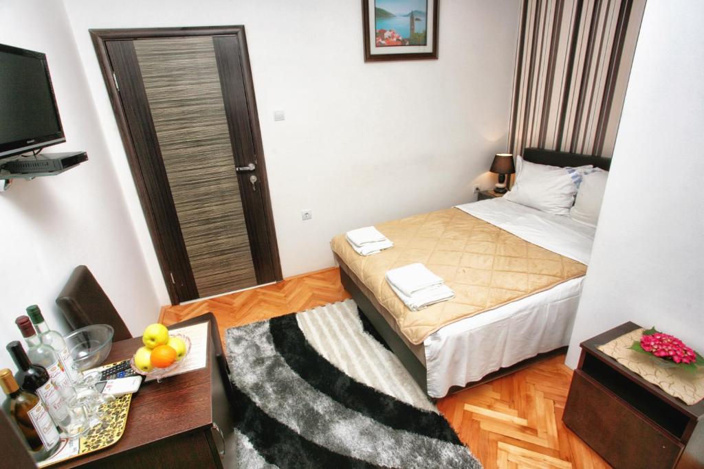 Postel nebo postele na pokoji v ubytování Apartments Obala - Katić