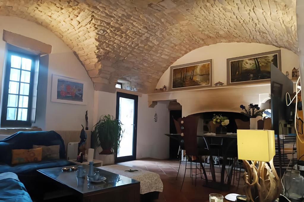 Posezení v ubytování Les Mimosas