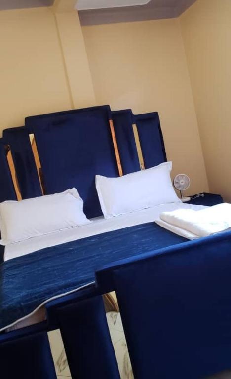 Postel nebo postele na pokoji v ubytování C&M Homes