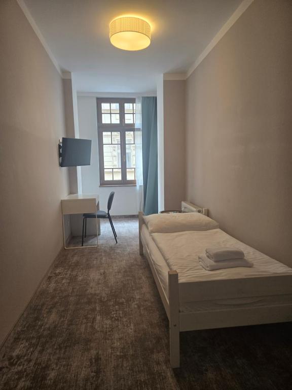 
Small Single Room with Private External Bathroom
