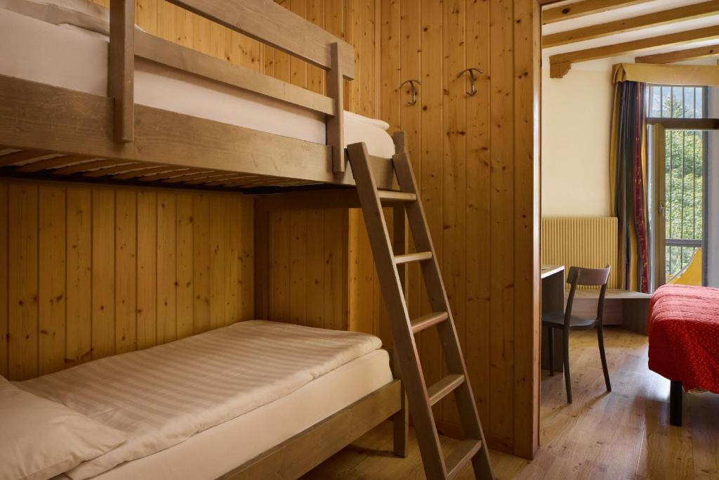 Postel nebo postele na pokoji v ubytování Hotel Portavescovo
