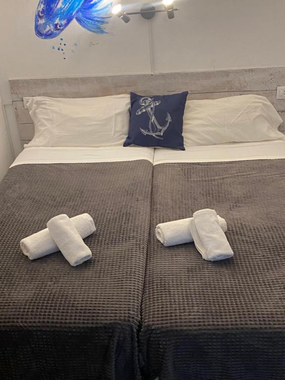 Posteľ alebo postele v izbe v ubytovaní Hotel Bergantí