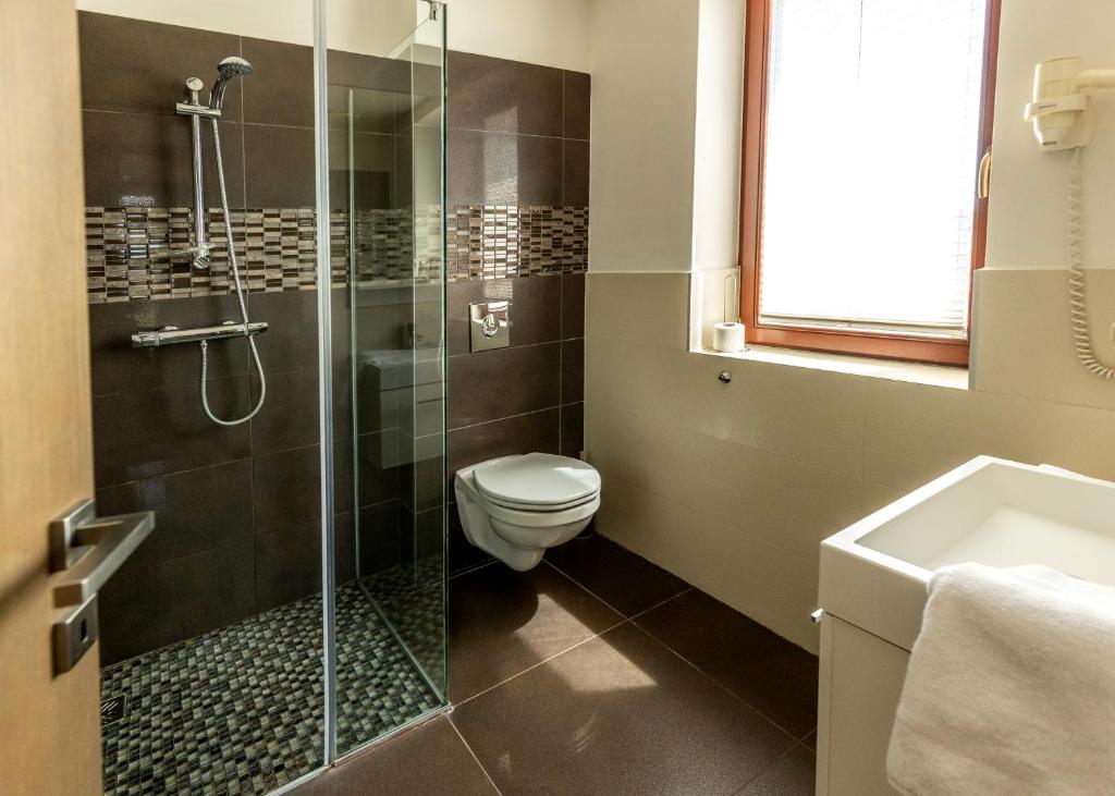 Koupelna v ubytování Mirage Hotel Sárvár