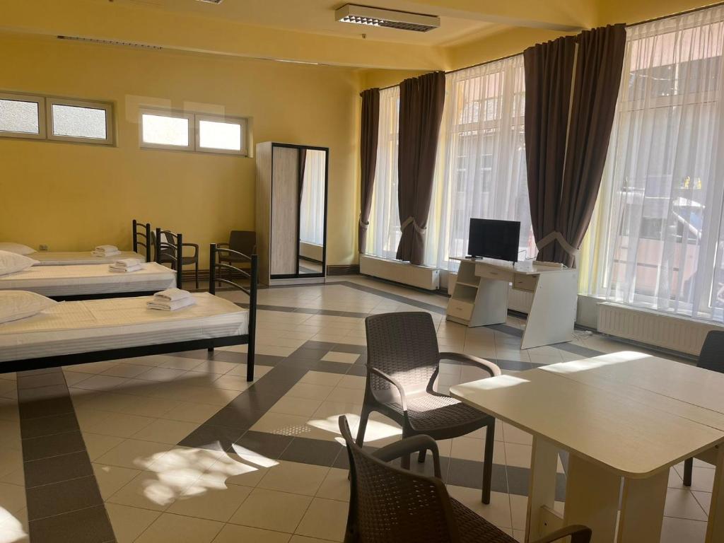 Postel nebo postele na pokoji v ubytování Tulipan Hotel Aquapark
