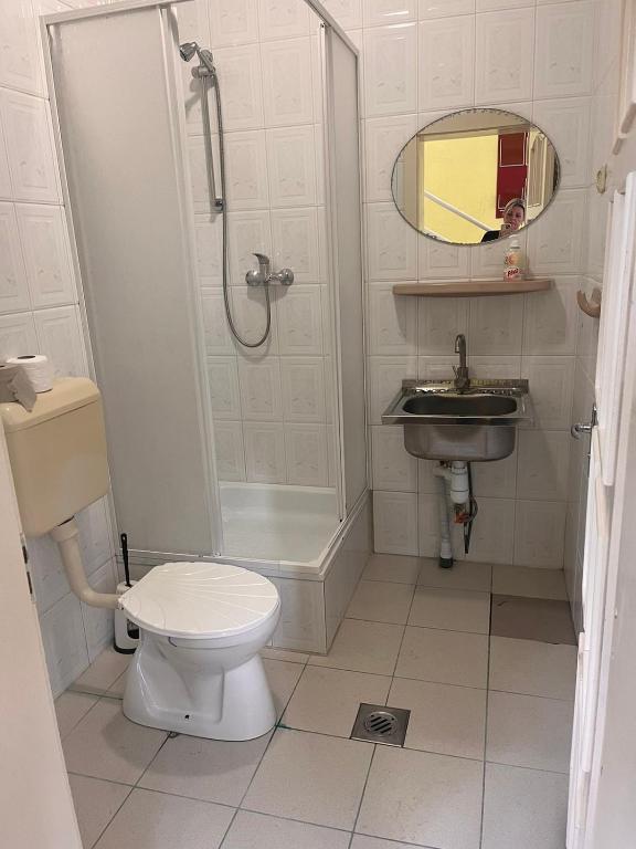 Koupelna v ubytování Tulipan Hotel Aquapark