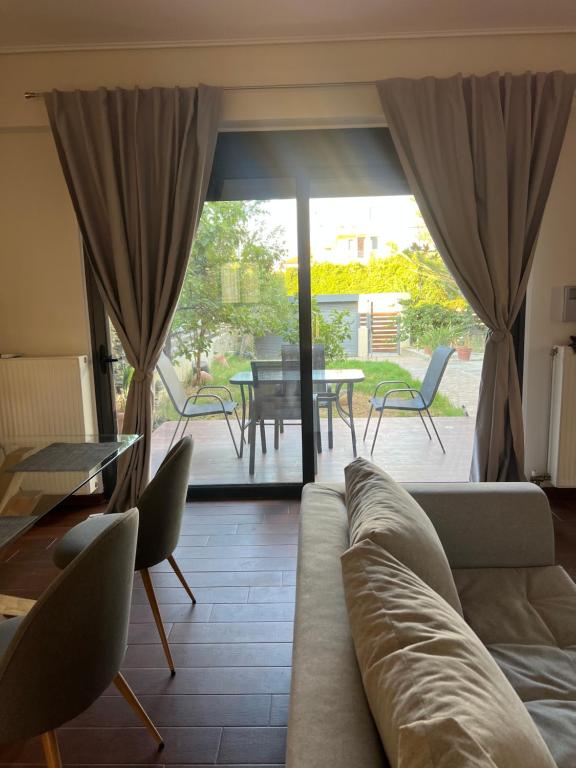 Posezení v ubytování The Nea Makri Hideaway