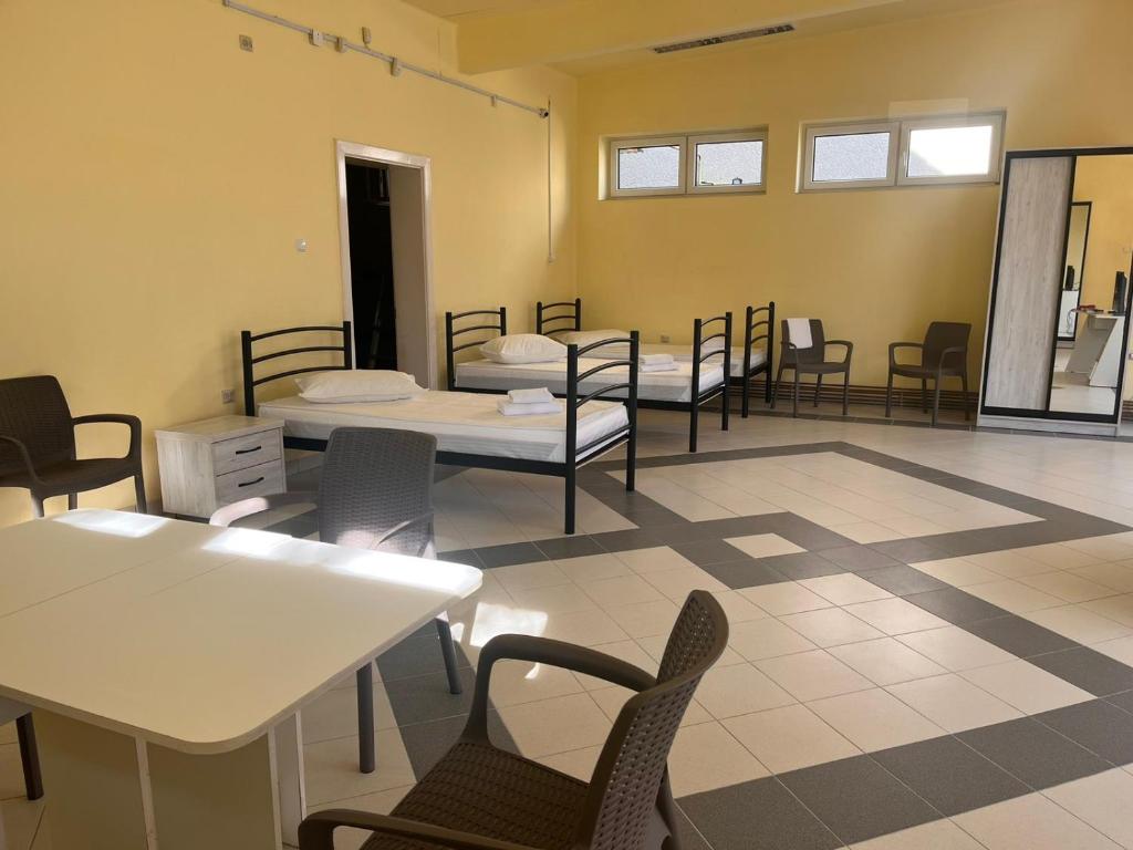 Postel nebo postele na pokoji v ubytování Tulipan Hotel Aquapark