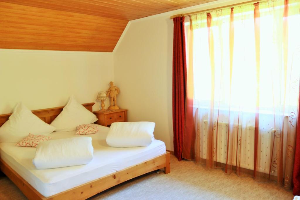 Postel nebo postele na pokoji v ubytování Casa Dan