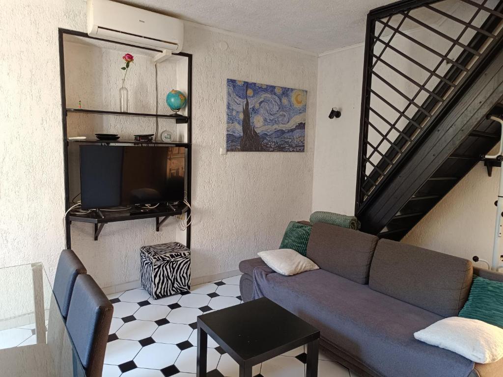 TV a/nebo společenská místnost v ubytování Apartman Paola