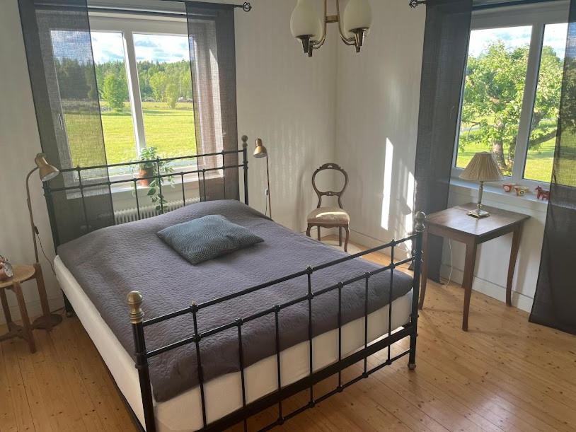 Postel nebo postele na pokoji v ubytování Hallhult
