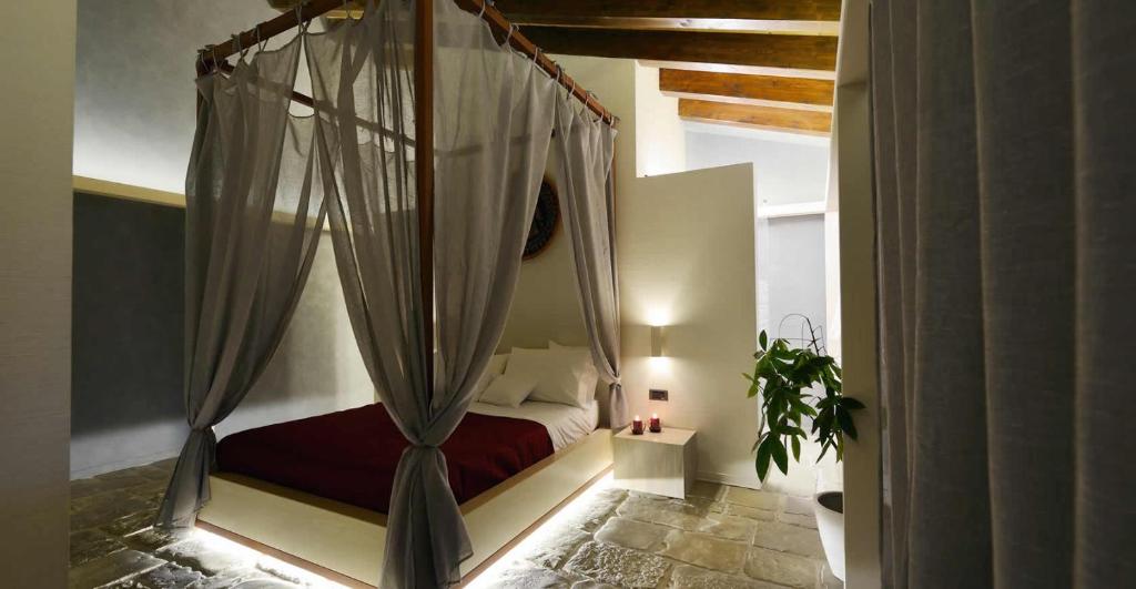 Katil atau katil-katil dalam bilik di Agrirelais Principe SPA