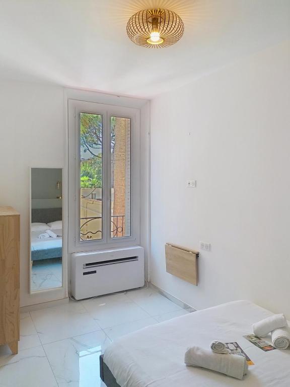 Posteľ alebo postele v izbe v ubytovaní Residence le Courbet