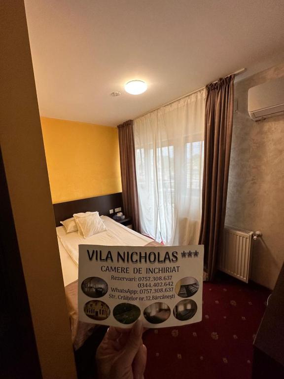 Postel nebo postele na pokoji v ubytování Vila NICHOLAS