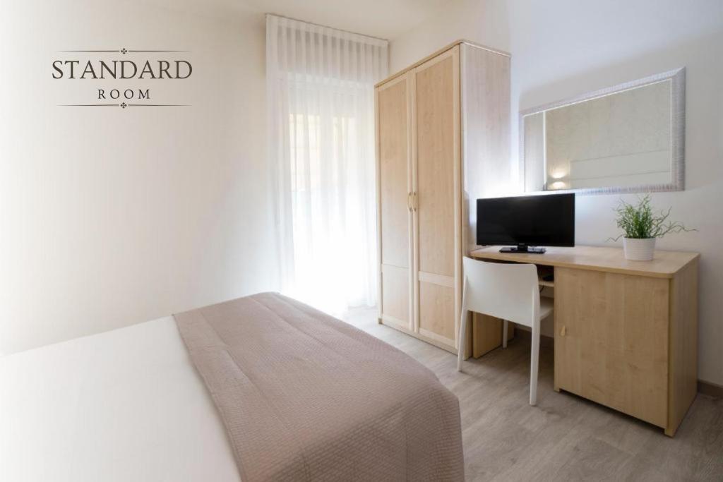 Postel nebo postele na pokoji v ubytování Hotel Constellation