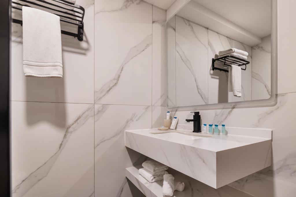Koupelna v ubytování Regency Inn