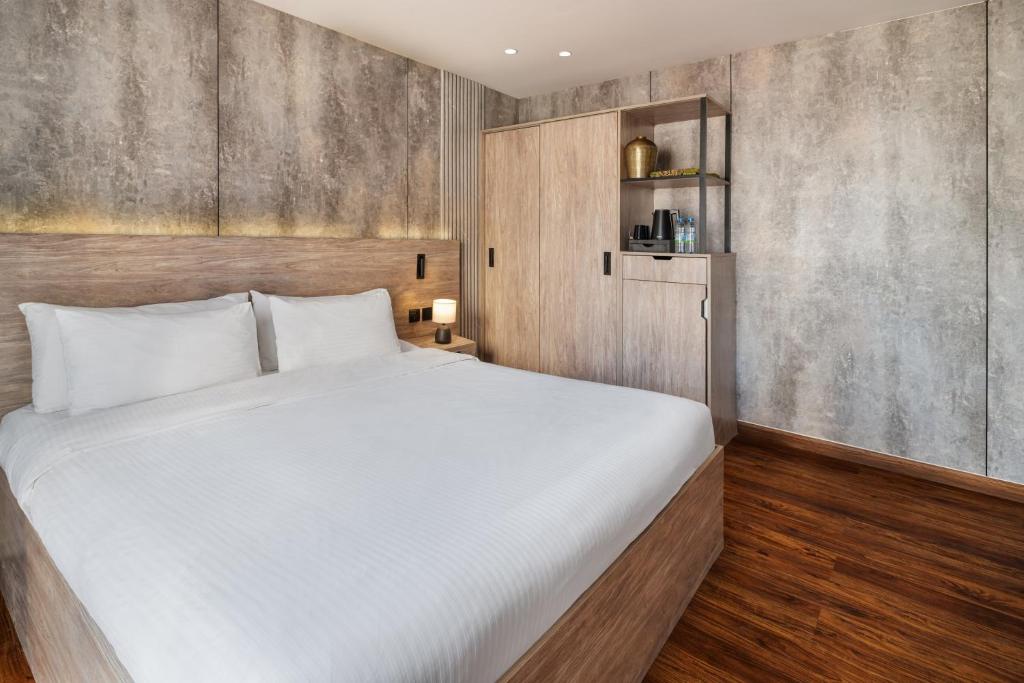 Postel nebo postele na pokoji v ubytování Regency Inn