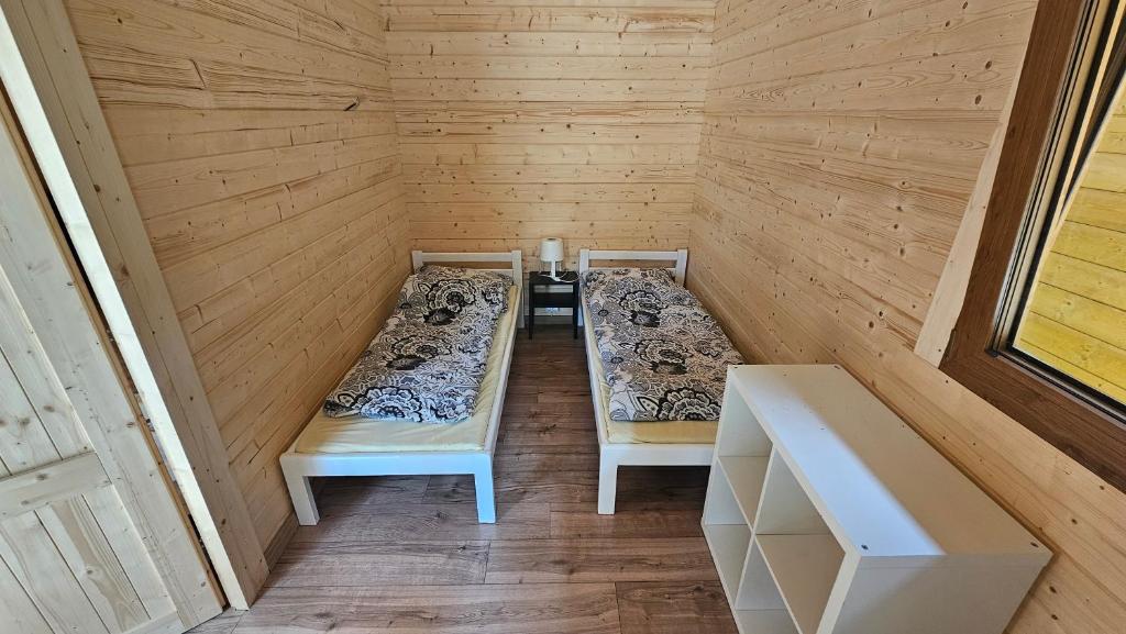 Posteľ alebo postele v izbe v ubytovaní Ośrodek BEATA / FIORD