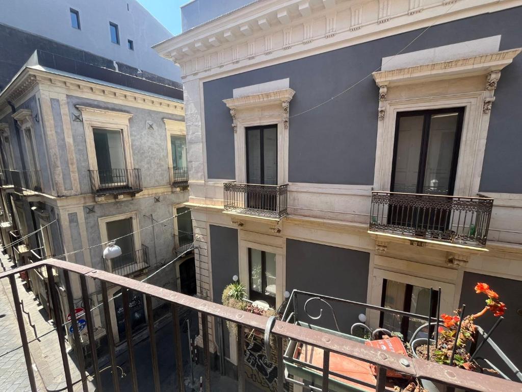 a view of a building from a balcony at La Torre in Catania