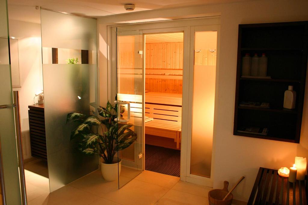 Postel nebo postele na pokoji v ubytování Hotel Riezler Hof