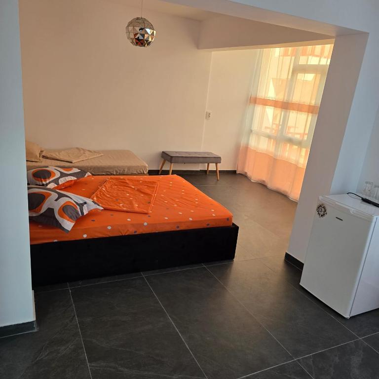 Postel nebo postele na pokoji v ubytování New House Philip