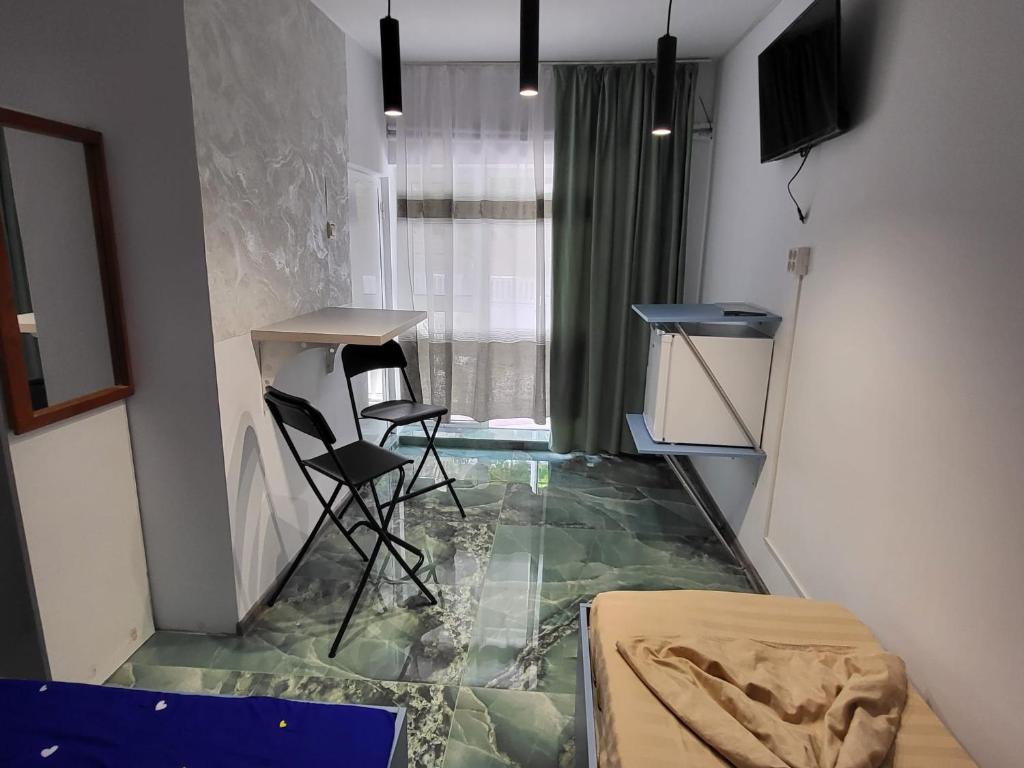 TV a/nebo společenská místnost v ubytování New House Philip