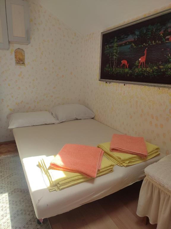 Postel nebo postele na pokoji v ubytování Lux Apartmans - VILA JUGOVO