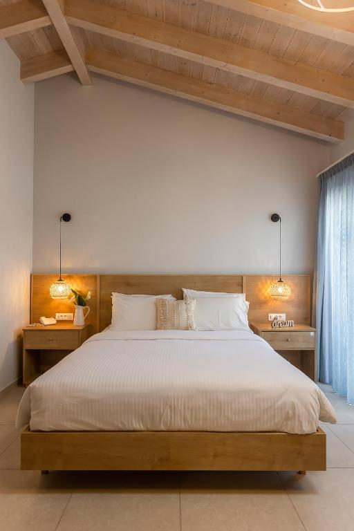 Postel nebo postele na pokoji v ubytování Telesilla Hotel