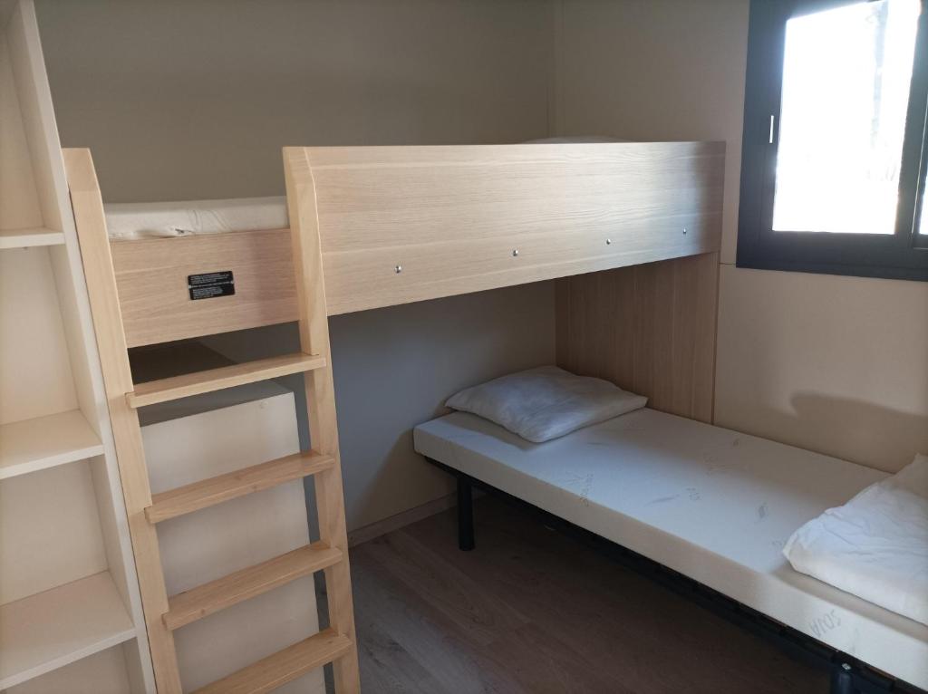 Postel nebo postele na pokoji v ubytování Camping Hello Soleil
