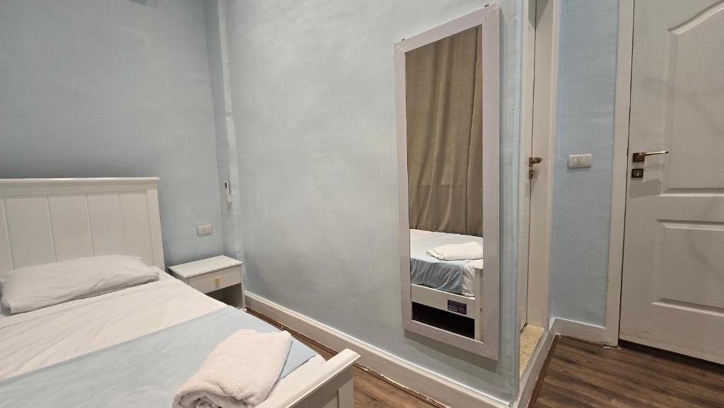 Postel nebo postele na pokoji v ubytování Dar Cairo Plus