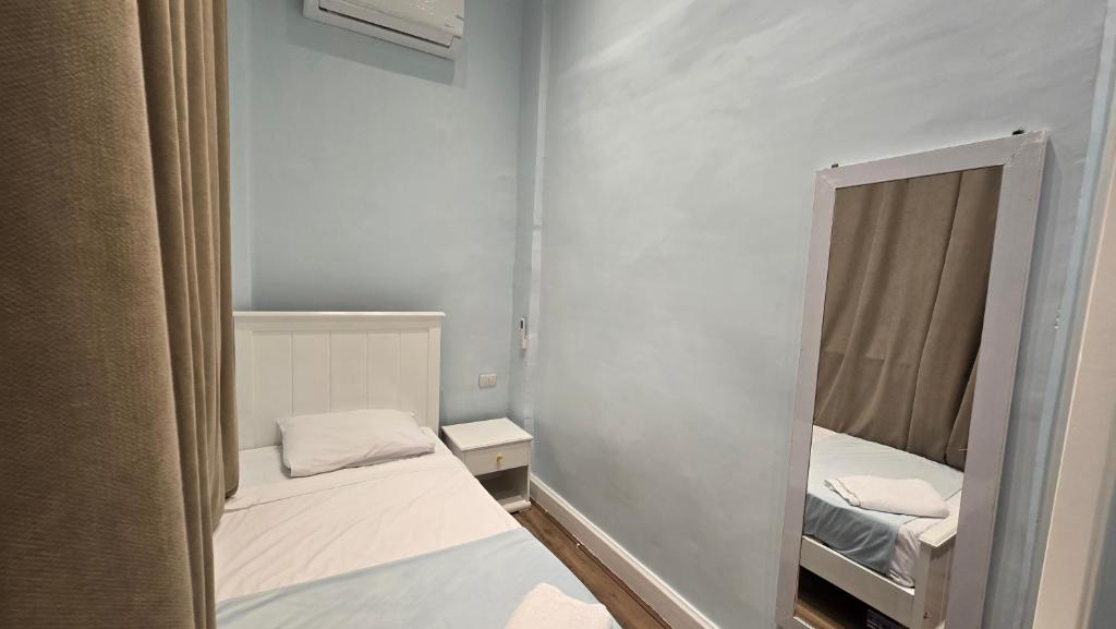 Postel nebo postele na pokoji v ubytování Dar Cairo Plus