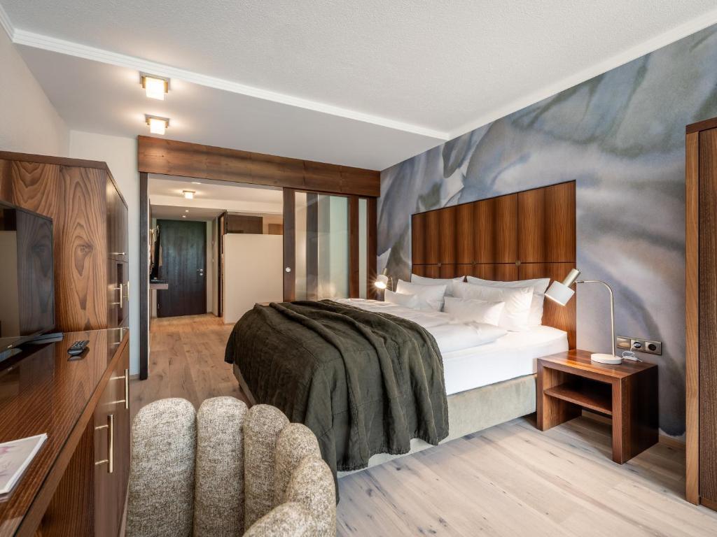 Postel nebo postele na pokoji v ubytování Hotel Rita
