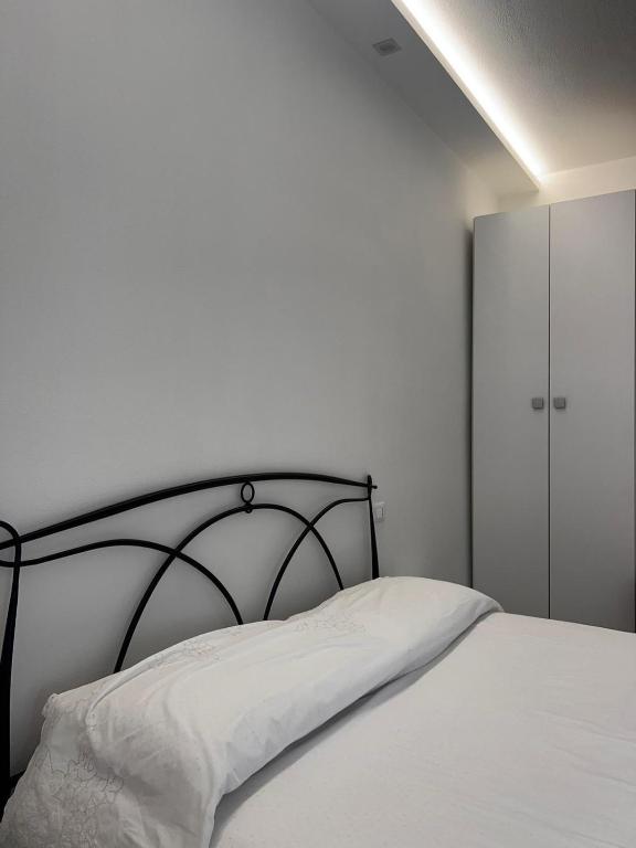 Postel nebo postele na pokoji v ubytování RoomsCarli