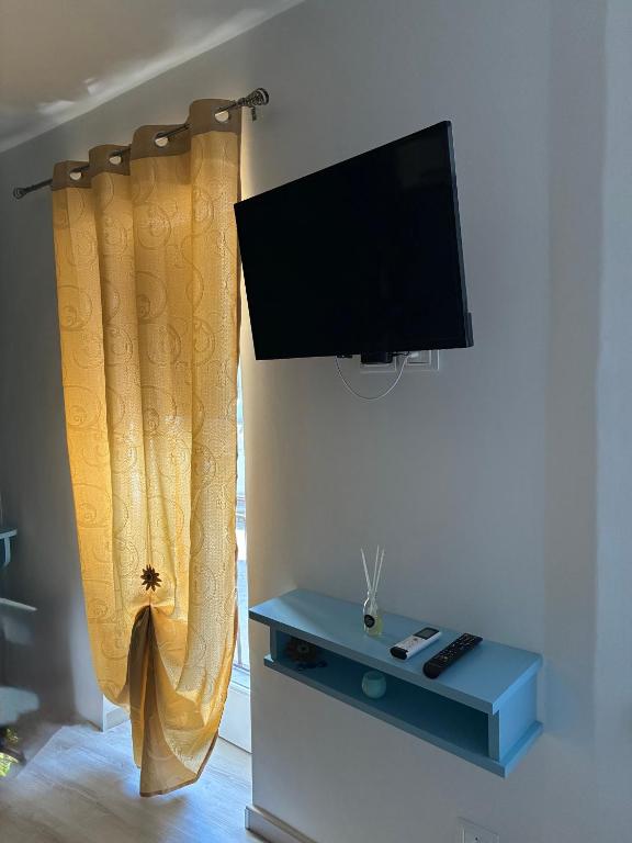 TV a/nebo společenská místnost v ubytování giadaffittacamere