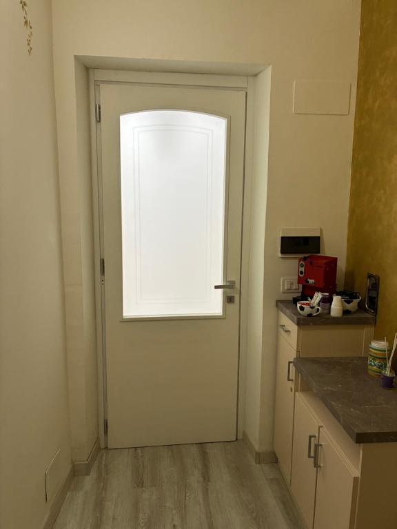 Kuchyň nebo kuchyňský kout v ubytování giadaffittacamere