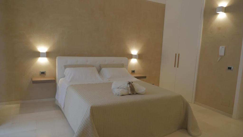 Postel nebo postele na pokoji v ubytování Borgo Marsala