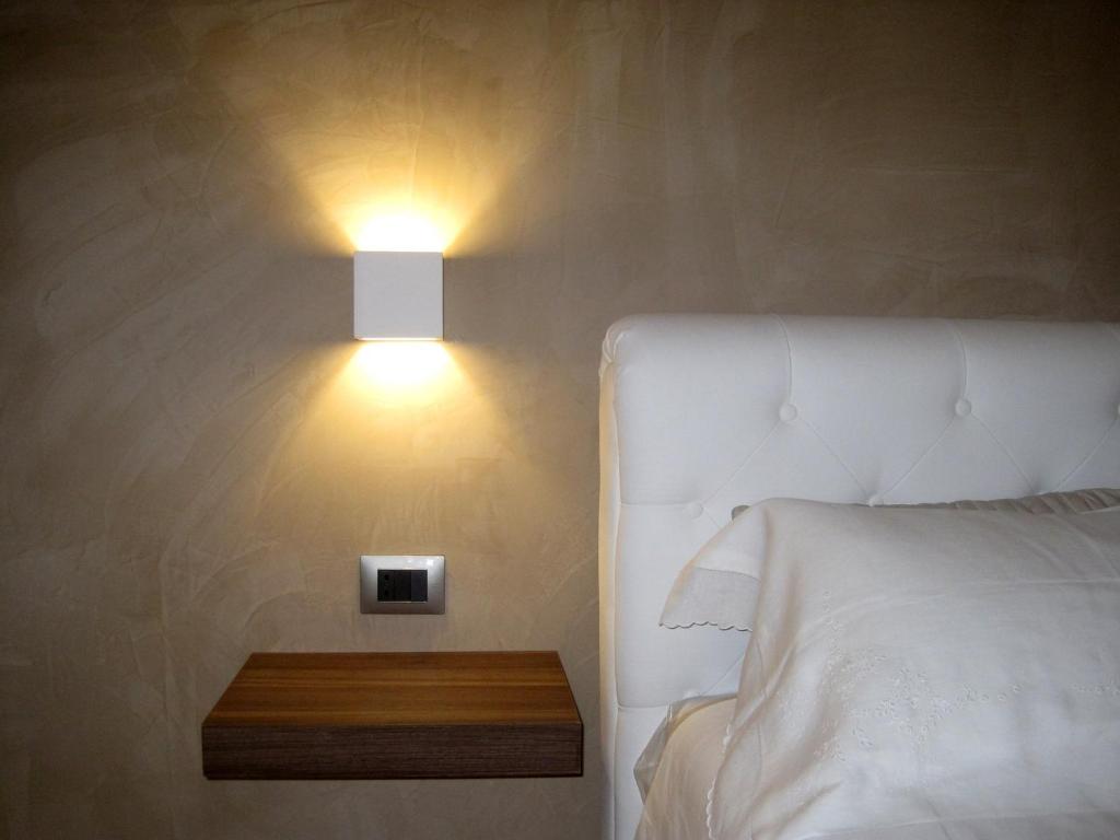 Postel nebo postele na pokoji v ubytování Borgo Marsala