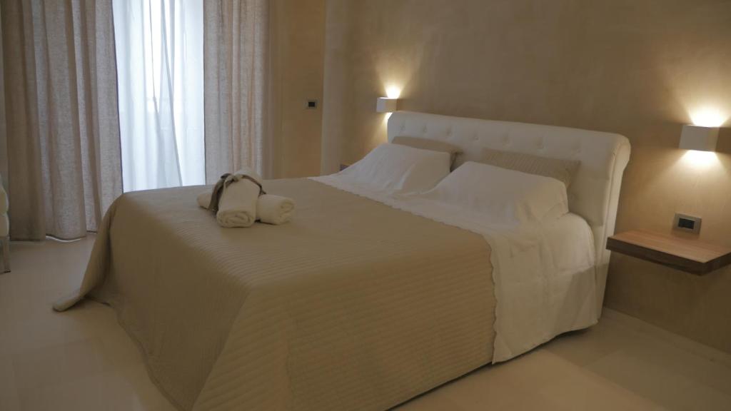 Postel nebo postele na pokoji v ubytování Borgo Marsala