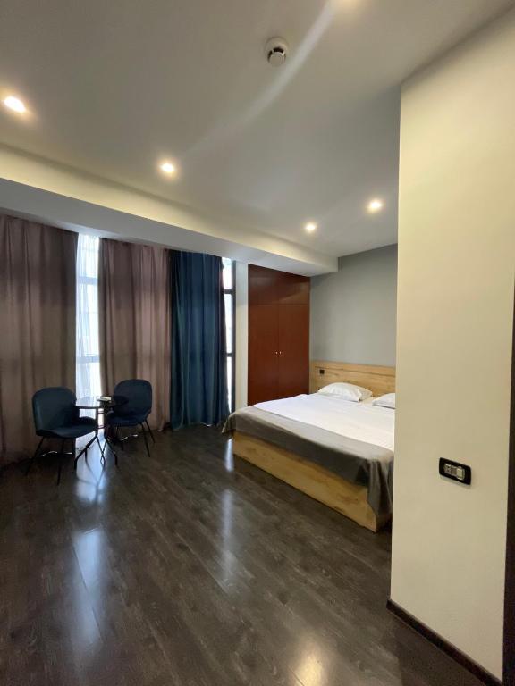 Postel nebo postele na pokoji v ubytování ABC Yerevan