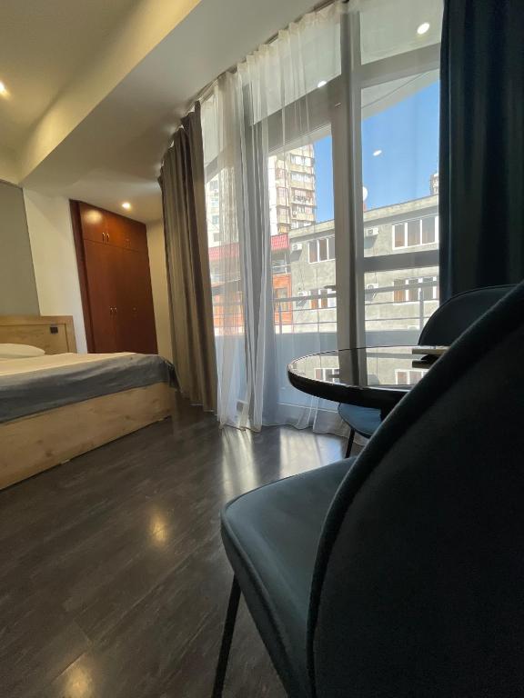 Postel nebo postele na pokoji v ubytování ABC Yerevan