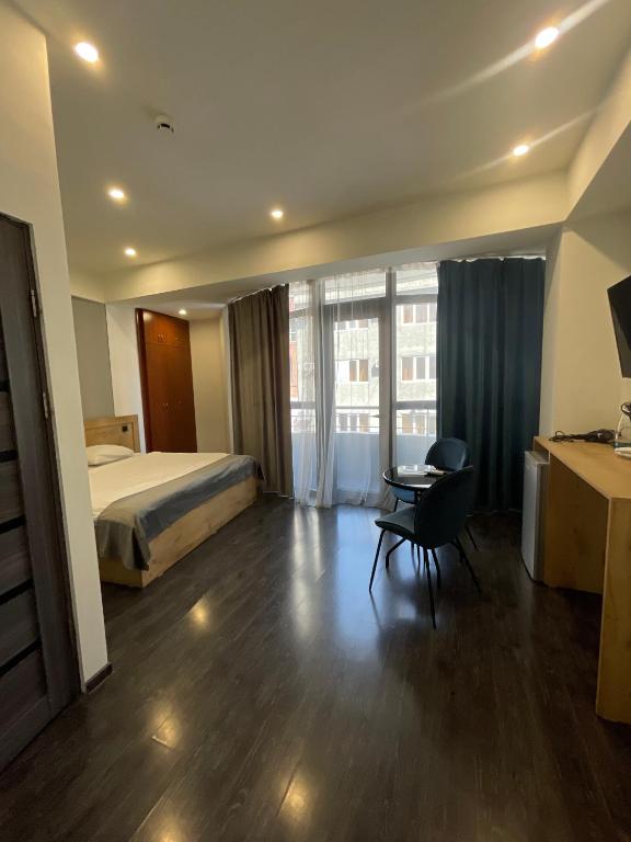 Postel nebo postele na pokoji v ubytování ABC Yerevan