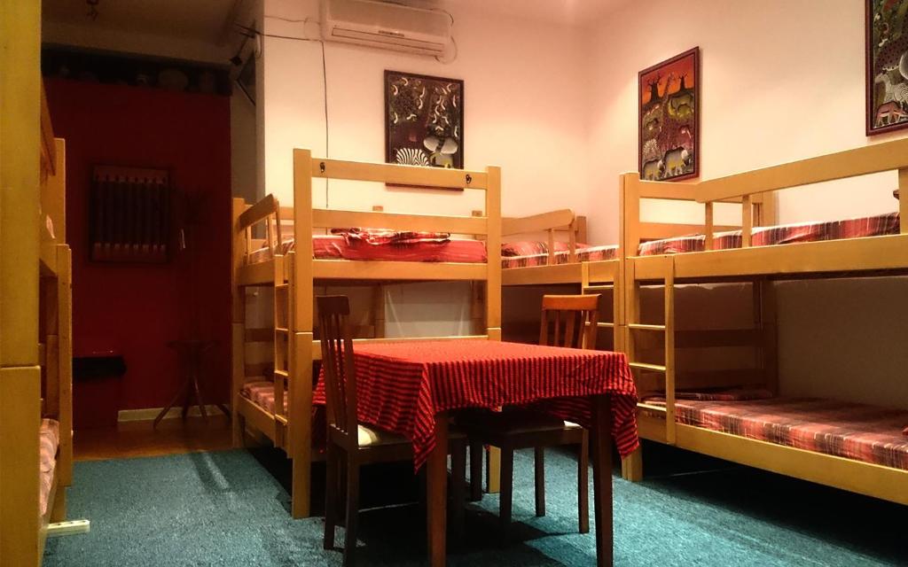 Postel nebo postele na pokoji v ubytování Sun Hostel