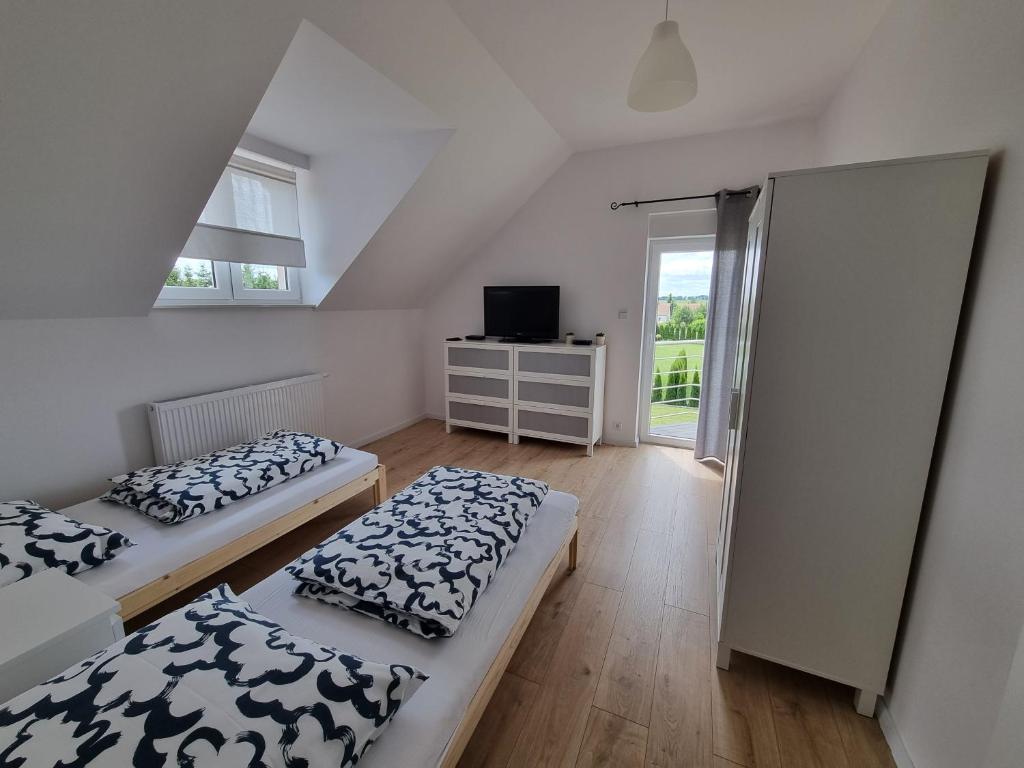 Posteľ alebo postele v izbe v ubytovaní Holiday Home Mierki